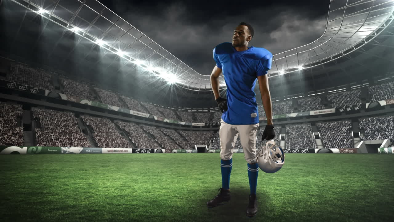 높이 서 있는 미식축구 선수