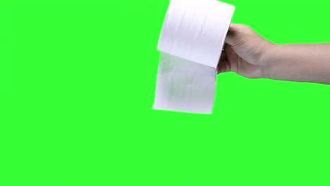hand holding tissue on green screen background