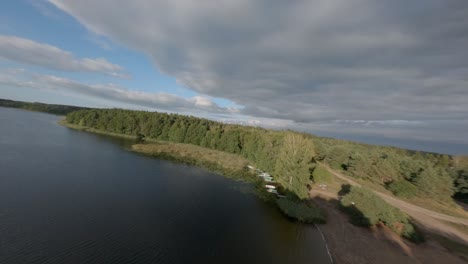 dense forest nature reserve park, masurian lake elk district, poland fpv