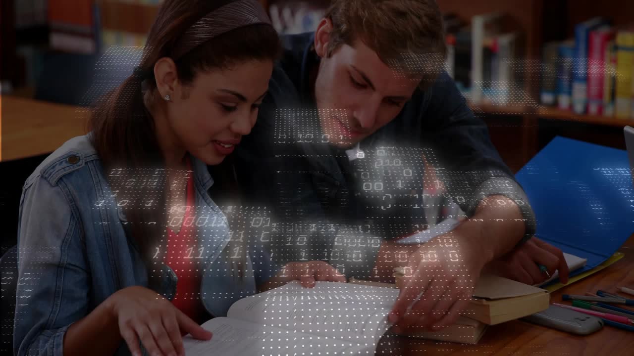 Woman flipping textbook pages, man leaning and pointing, binary overlay appearing during study
