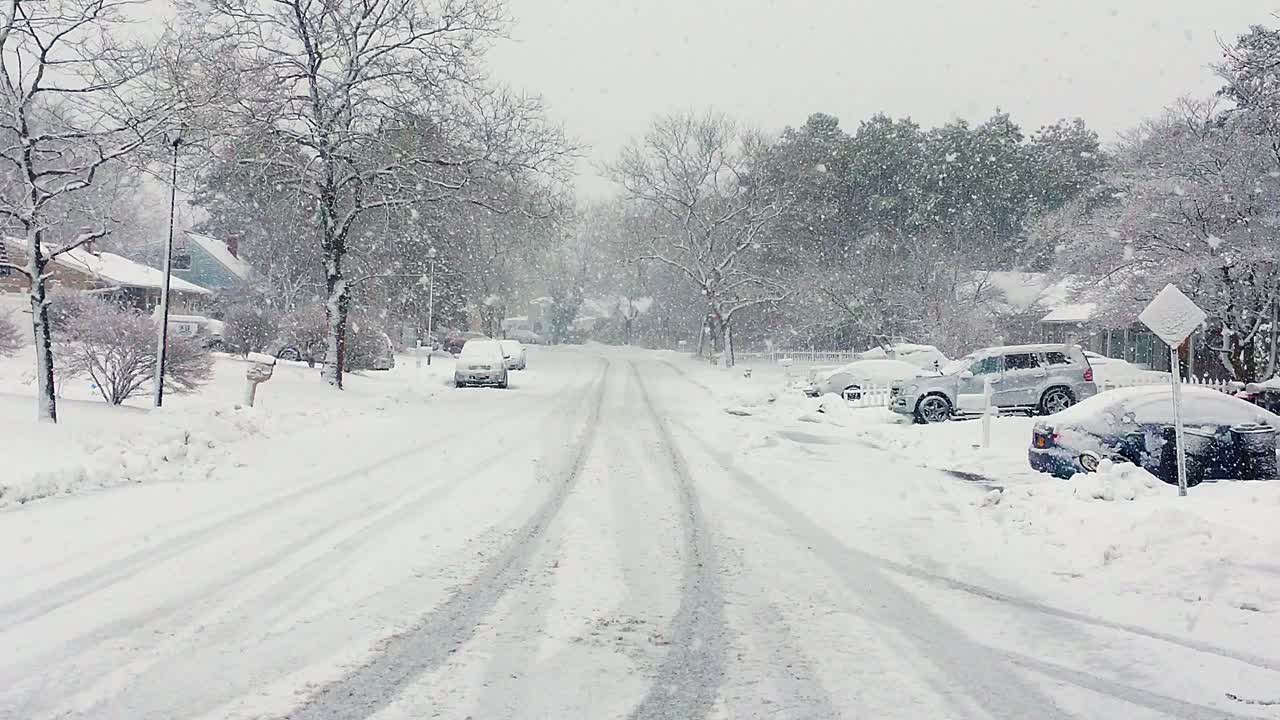 Heavy Snowfall on Residential Street