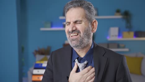 worried businessman standing at home overwhelmed and panicked.