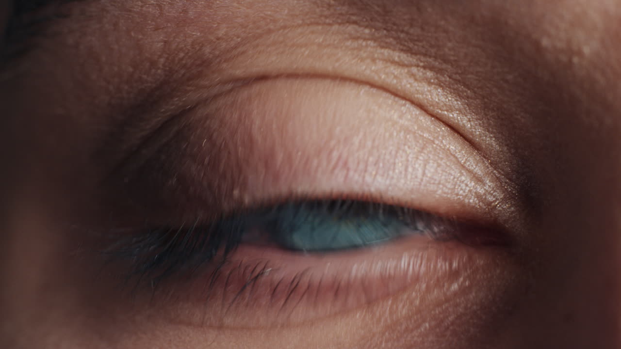 macro close up blue eye blinking natural human beauty healthy eyesight concept