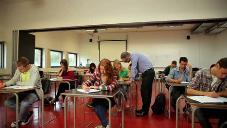 blonde student asking a question in class