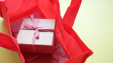 red gift bag with presents