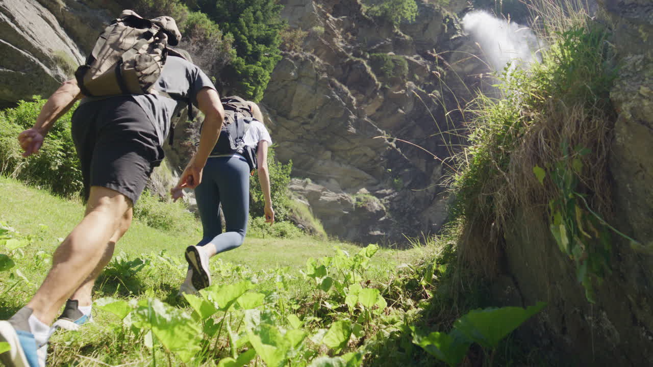 Two hikers explore Saas-Fee, Saas-Balen, and the Saas-Almagell dam, passing waterfalls, marmots, and alpine peaks in a breathtaking high-mountain landscape.
