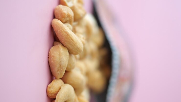 Cashews on a Pink Surface
