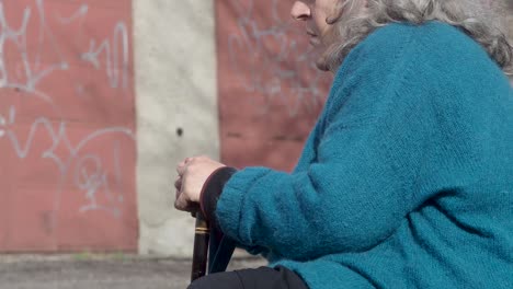 senior woman resting suffering tremor suffering pakinson's desease symptom. mental health and elderly care concept