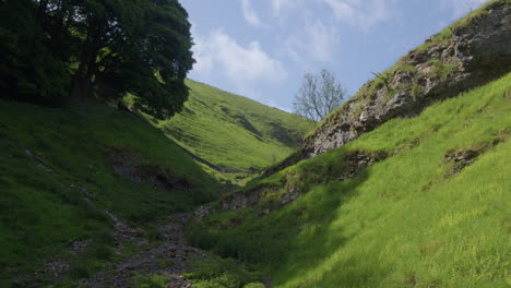 view midway up cave dale showing a path going uphill