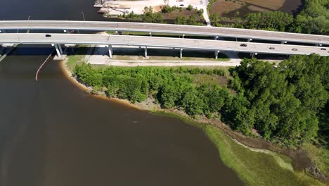 Vehicles-Driving-On-West-Bay-Bridge-Spanning-West-Bay-In-Panama-City-Beach,-Florida