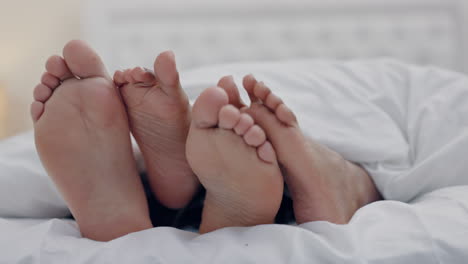 couple, feet and play in bedroom in home