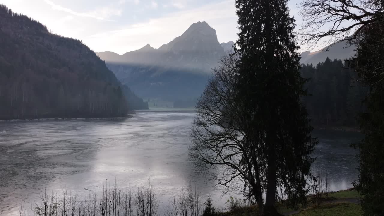 Serene lake with reflections surrounded by majestic mountains, located in Obersee, Nafels, Glarus, Switzerland. Capturing natural beauty, tranquility, and scenic landscapes.