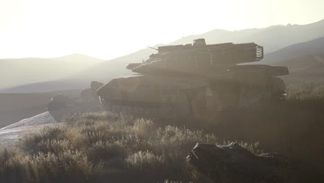 old rusty tank in the desert at sunset