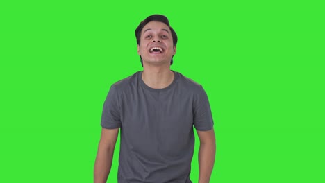 Indian-man-laughing-on-someone-Green-screen