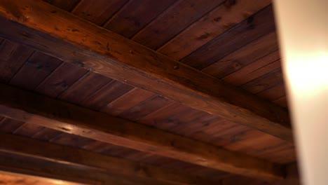 rich red wooden ceiling in handmade countryside cabin getaway retreat with foreground