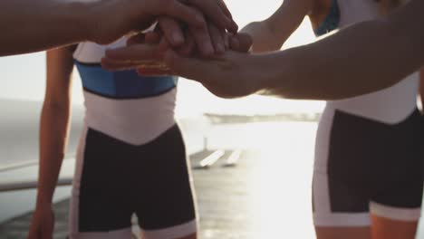 female rowing team training on a river