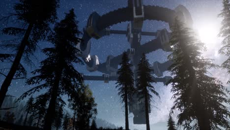 ovni sobrevolando un bosque por la noche