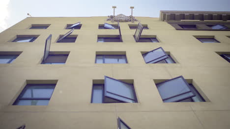 Building Facade with Open Windows