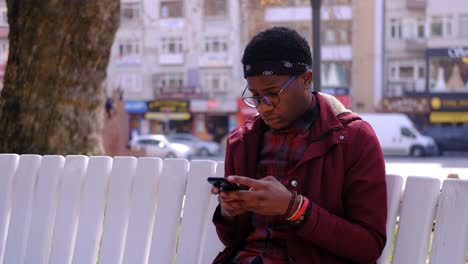 Black-Young-Man-Smart-Phone