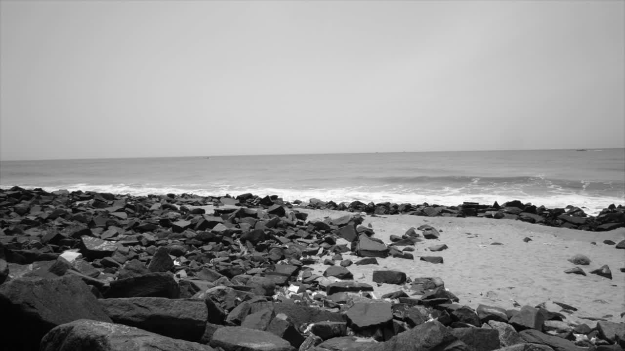 beach during the day time panorama shot in black and white