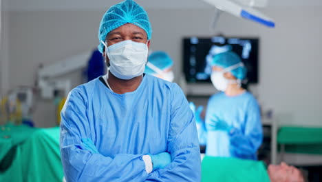 Man,-surgeon-and-arms-crossed