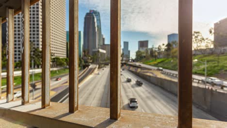 Rusty-Railings-Of-4th-Street-Bridge-with-Traffic-On-Interstate-110-Highway-In-Los-Angeles,-California