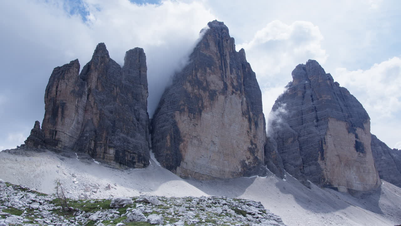 Die 3 Zinnen or The Tre Cime di Lavaredo. Short Timelaps with Clouds