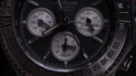 closeup of a breitling chronograph watch