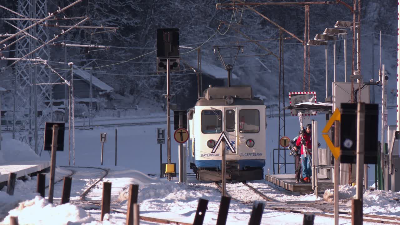 Narrow gauge train departing Hausberg station, close to Garmisch-Partenkirchen in Bavaria, Germany