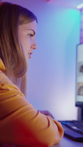young woman working on computer. happy casual beautiful woman working on computer
