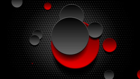 círculos brillantes rojos y negros en fondo perforado oscuro animación de video