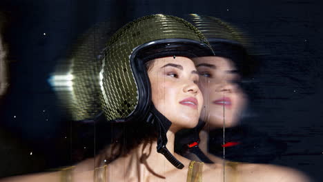 woman poses with mirrorball bunny ears