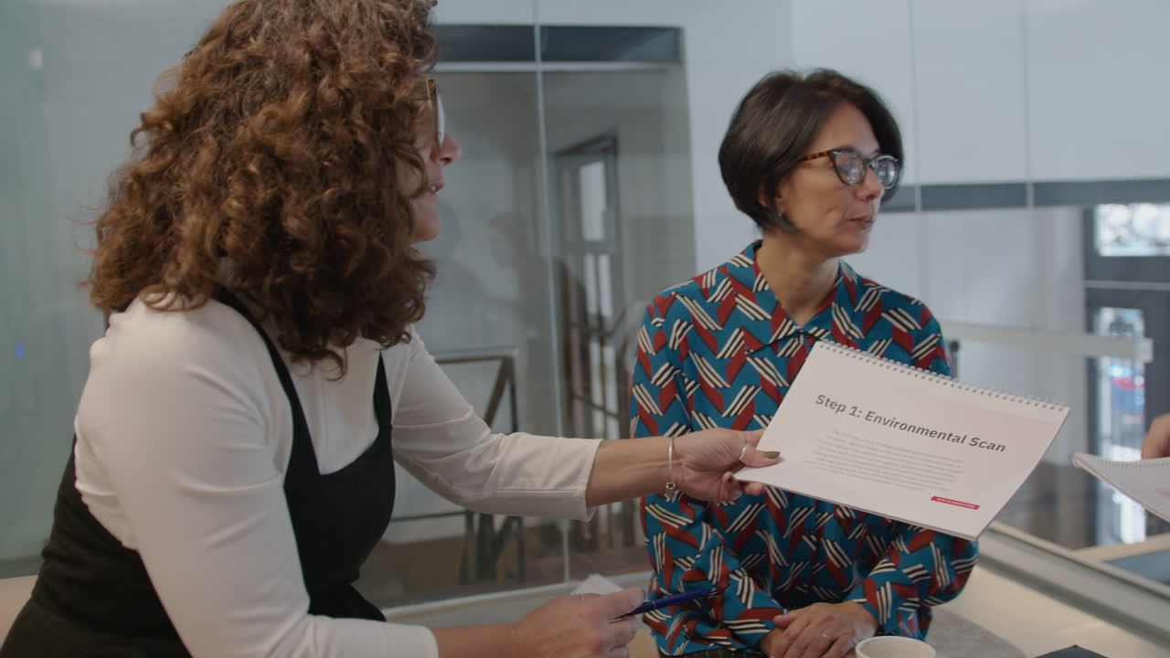 Senior Business People Having Team Meeting in Coworking Office