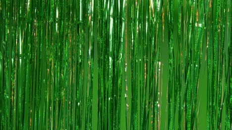 Full-Frame-Background-Shot-Of-Green-And-Gold-Tinsel-In-Studio-For-St-Patrick's-Day