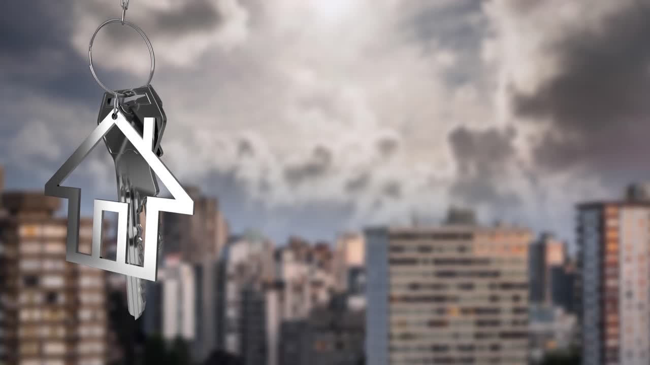 Animation of silver house key fob with key over out of focus cityscape