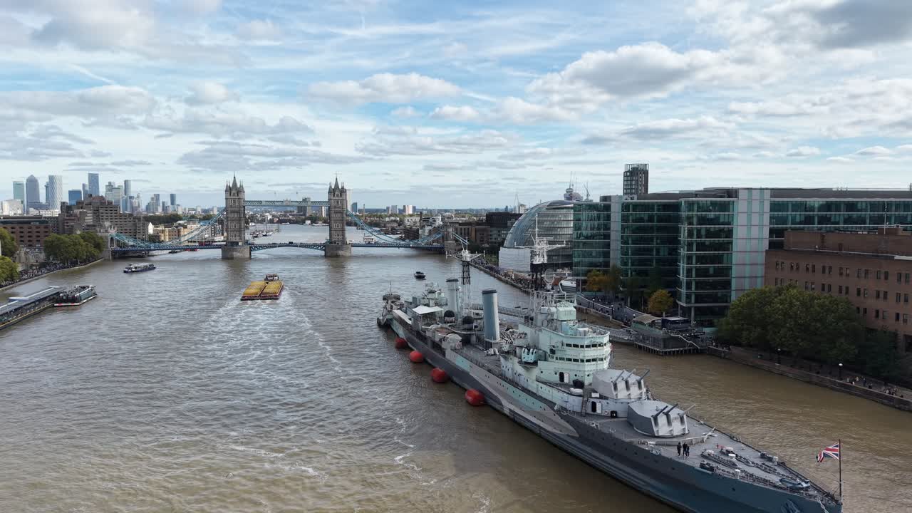 London ,HMS Belfast moored on river Thames Tower bridge in background ,aerial