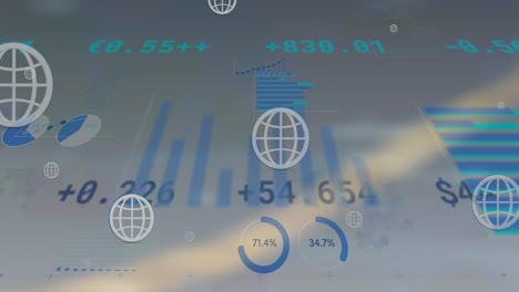 animation of multiple web globe icon floating over statistical data processing on grey background