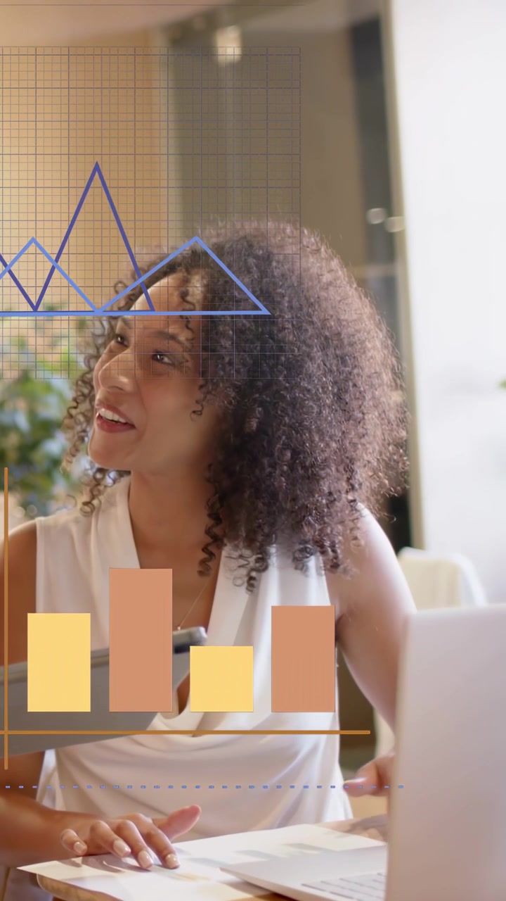 Vertical video: Woman typing tapping pad pointing papers causing business charts overlay for review