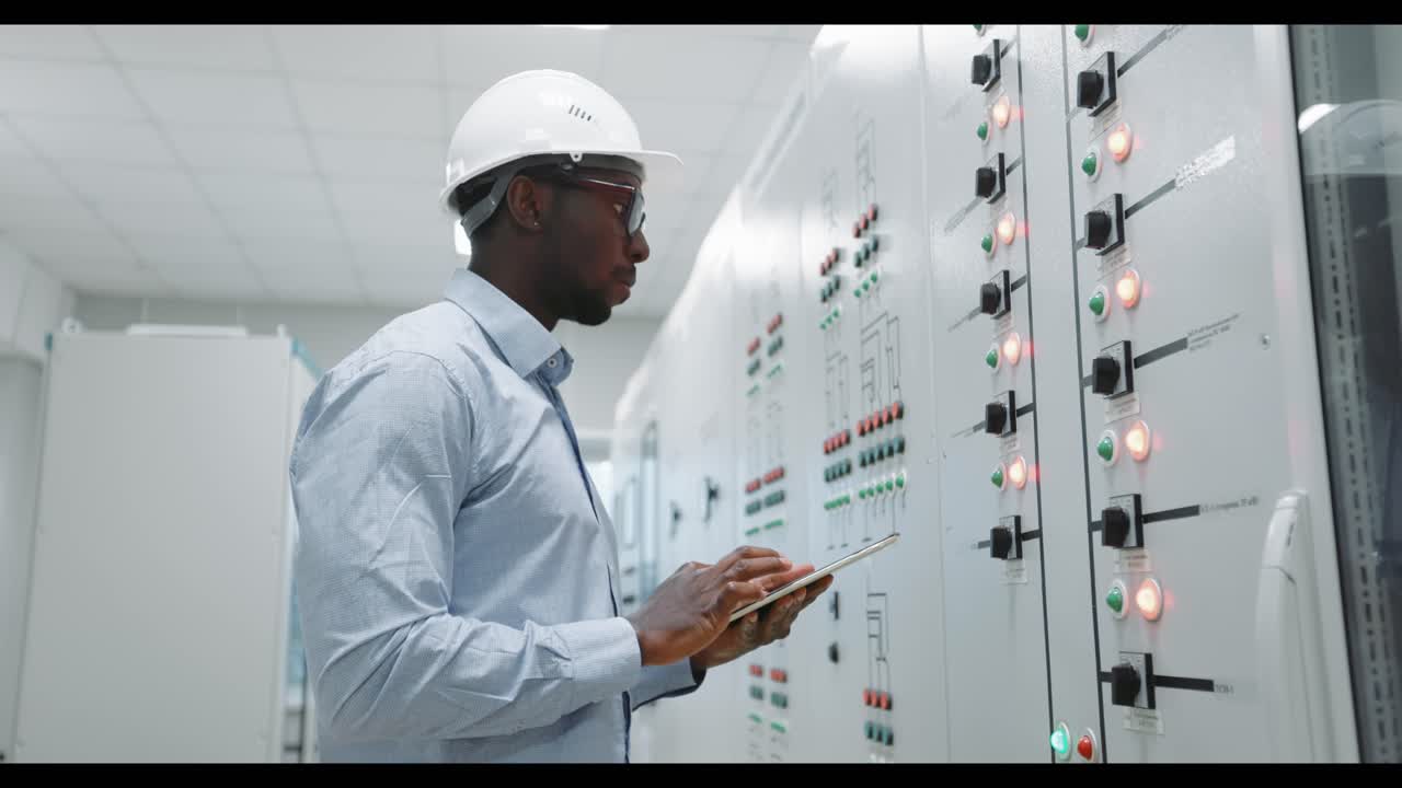 Engineer working on a control panel