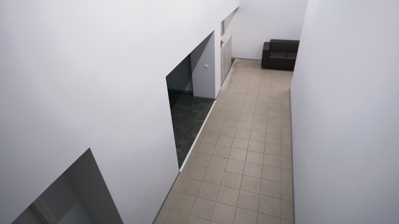 Various scenes in a modern office hallway, including business interactions and an empty space