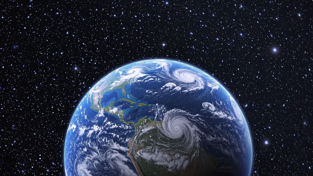A video still of Earth from space, showcasing the planet's vibrant colors against a starry backdrop