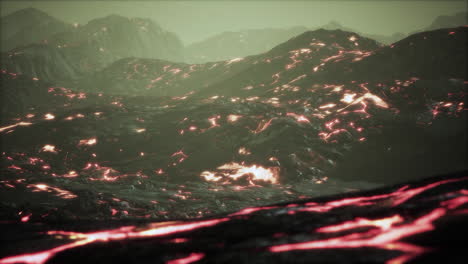 black lava field with hot red orangelavaflow at sunset