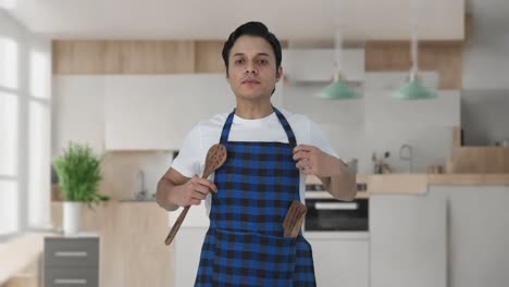 happy indian cook getting ready