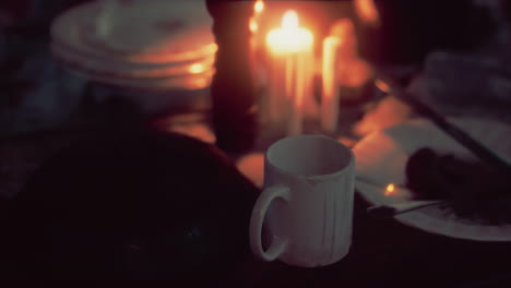 Table-setting-in-candlelight-at-night