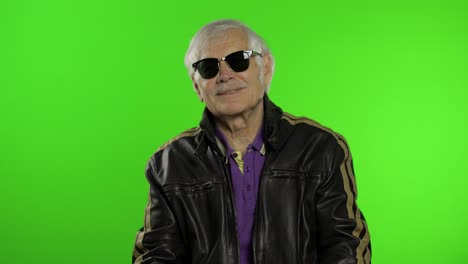 Elderly-caucasian-grandfather-rocker-and-biker-man-on-chroma-key-background