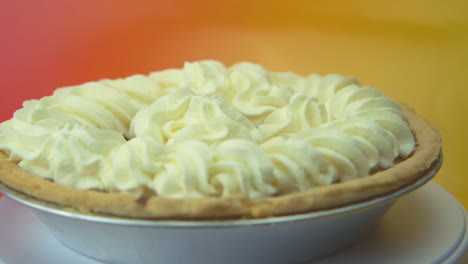 [camera used: canon c300] rotating pumpkin pie loaded with fluffy whipped cream