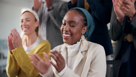 group of diverse business professionals clapping in celebration