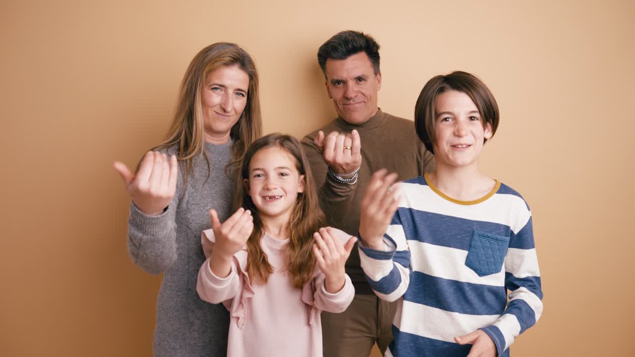 Happy Family Beckoning with Hand Gestures in Studio