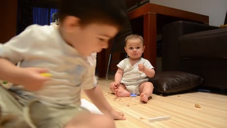 cute-siblings-made-huge-mess-on-the-floor