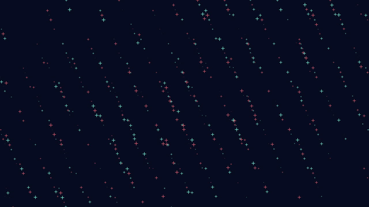Particelle colorate a forma di segno più che fluttuano su sfondo scuro, filmato astratto in movimento.